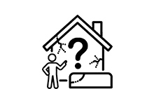 外壁の劣化状態を確認している様子